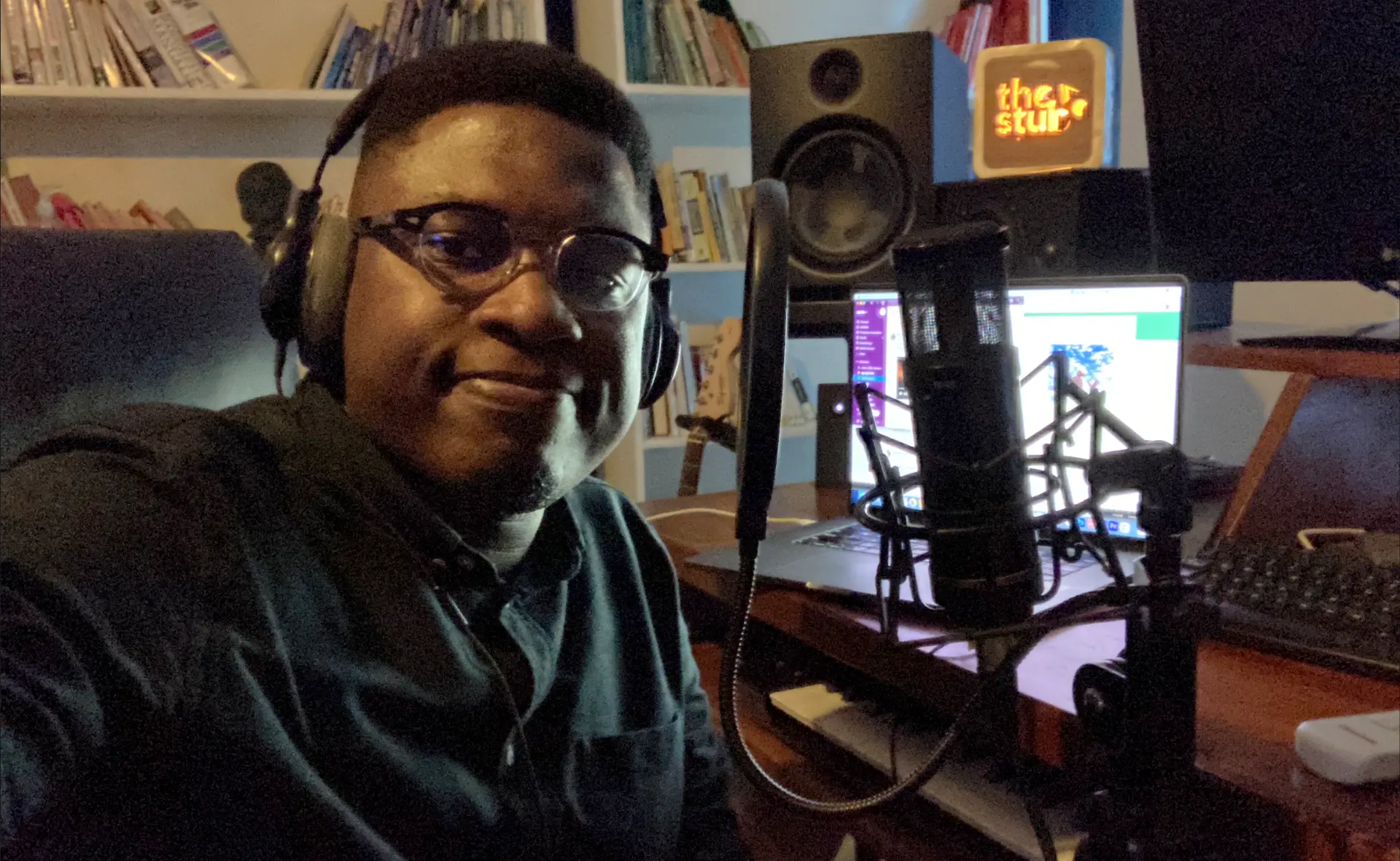 Antoine Mensah recording in his home voice-over studio